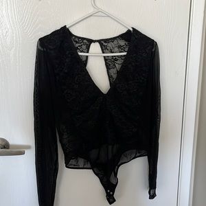 DYNAMITE Long sleeve black body suit size L